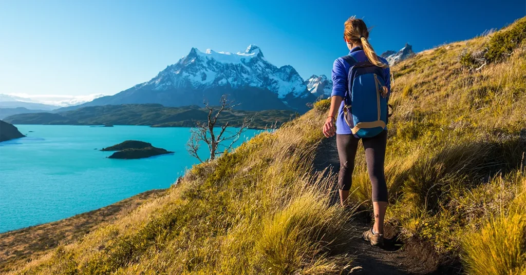 Superyacht charter guest hiking the mountain trails in Patagonia